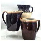 (3) Brown Glaze Stoneware Pitchers