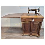 Antique Damascus Treadle Sewing Machine in Wooden