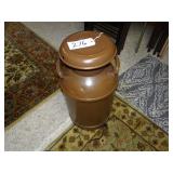 Brown painted milk can