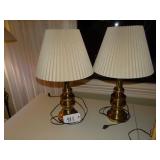 Two brass base matching table lamps