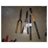 Fiskars pruners and 2 hedge trimmers