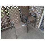Four highback outdoor patio chairs