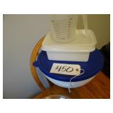 Tupperware containers and plastic measuring cups