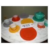 Assorted pastel mini-plates/cups, similar to Fiest