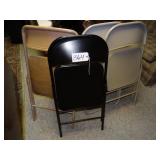 Four assorted folding chairs, some padded, some no