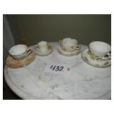 Assorted teacup sets:  German, Limoges France, and