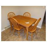 Oak dinette table and four chairs 4' long x 32' wi