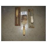 Assorted concrete trowels