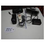 Assorted alarm clocks, Wahl hair clippers, Norelco