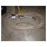 Garden hose and extended spray nozzle