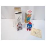 Tin windup robots with boxes