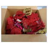 Box of plastic ornaments and decorations