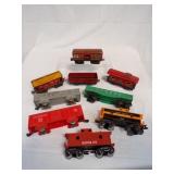 Plastic and Tin Marxs train cars