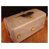 Vintage tackle box with lures and fishing tackle