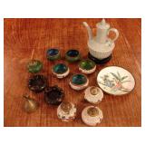 Small tea serving cups and salt and pepper shakers