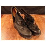 Set of black military combat boots.