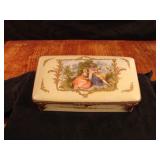 Vintage French porcelain hand painted jewelry box.