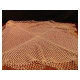Vintage crocheted doilies of various size.