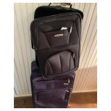 2 Rolling Medium Sized Luggage