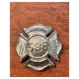 Metal Franklin Square firefighters badge
