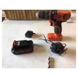Black & Decker drill with battery charger & one dr