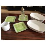 A lot of small plates bowls ,creamer cup and shake