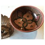 Bowl with small wooden statue