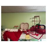 Lot of red kitchen decor including Temptation h..