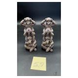 ï¿½Three Wise Monkeys' totems, representing the p..