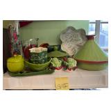 Lot of green kitchen decor including Temptation..