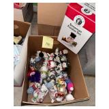 Box of snowman ornaments and fondue set