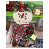 Box of Christmas decor, including Cross Stitch ..