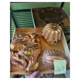 Copper molds including a rooster