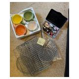 Vegetable mugs, assorted butter knives, and bak..