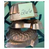 Copper molds including fish