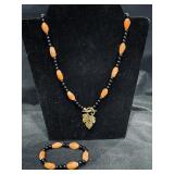 Orange and black, beaded necklace and matching ..