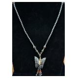 Hemalyke necklace featuring a butterfly pendant