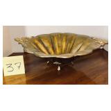 Vintage hammered brass centerpiece bowl featuri..