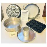 Assorted bakeware items, including a Frieling g..