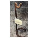 Rustic handmade iron hat rack featuring a horse..