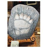 Cast replica of a Grizzly Bear paw track