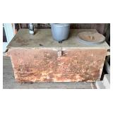 Heavy-duty metal storage chest used for wood st..