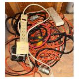 Assorted extension cords and power surge protec..