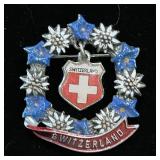 Vintage enamel floral wreath brooches from Swit..