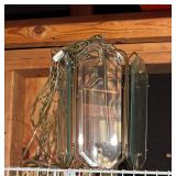 Brass chandelier from the 1970s features a dist..