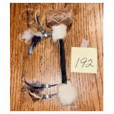 Native American handcrafted rattle, often used..
