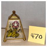 Vintage faux stained glass trinket box features..