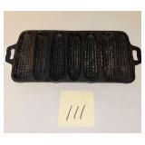 Vintage cast iron corn stick pan 76 on back
