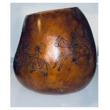 Handmade gourd art vessel featuring etched and ..