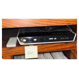 DVD player features a front-loading disc tray, ..